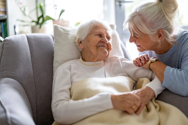 Elderly,Woman,With,Her,Caregiver,At,Nursing,Home